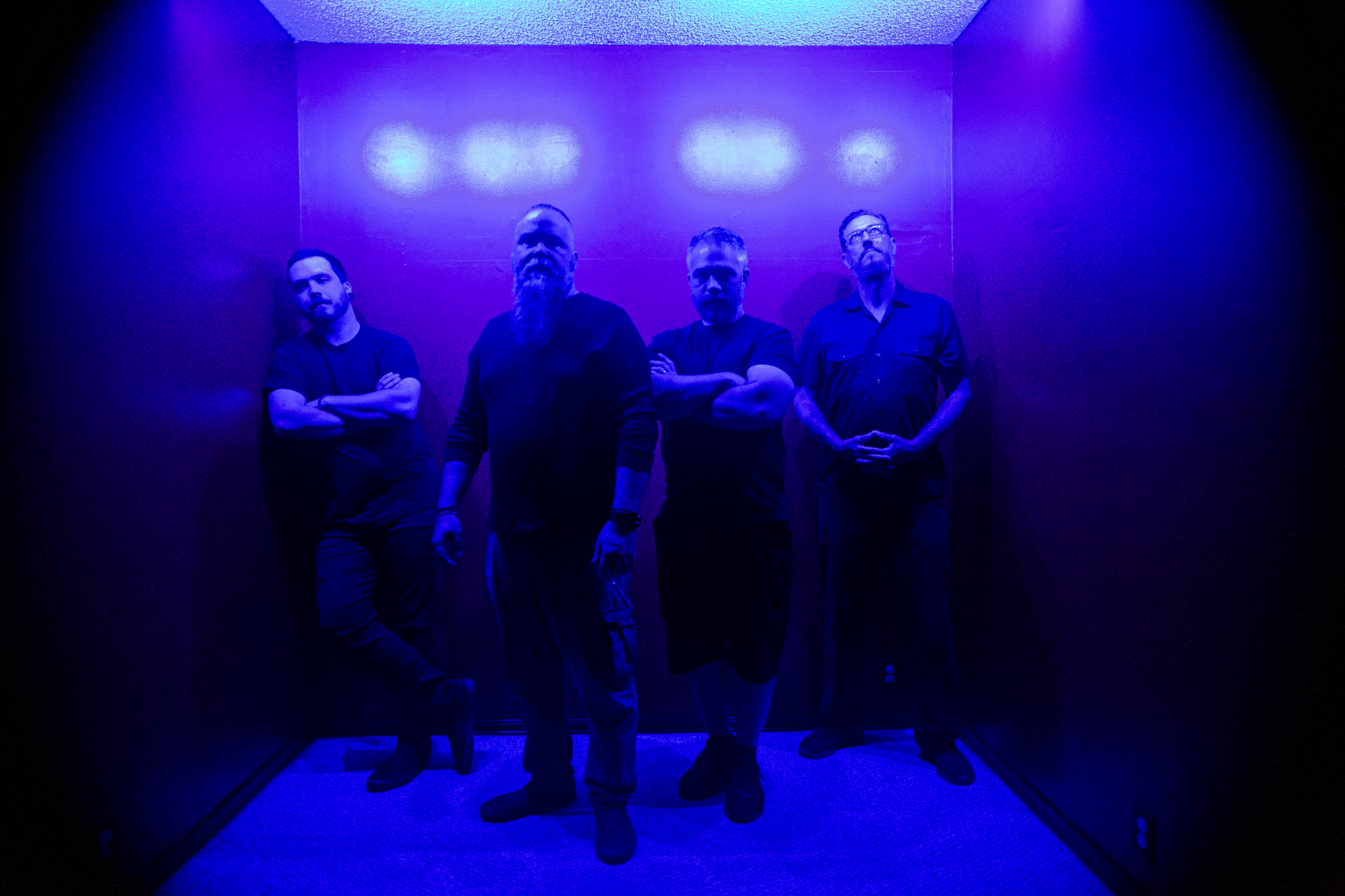 EdgeOverEdge band promotional photograph in blue and violet lighting